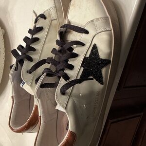 White Sneakers with Black Star Detail